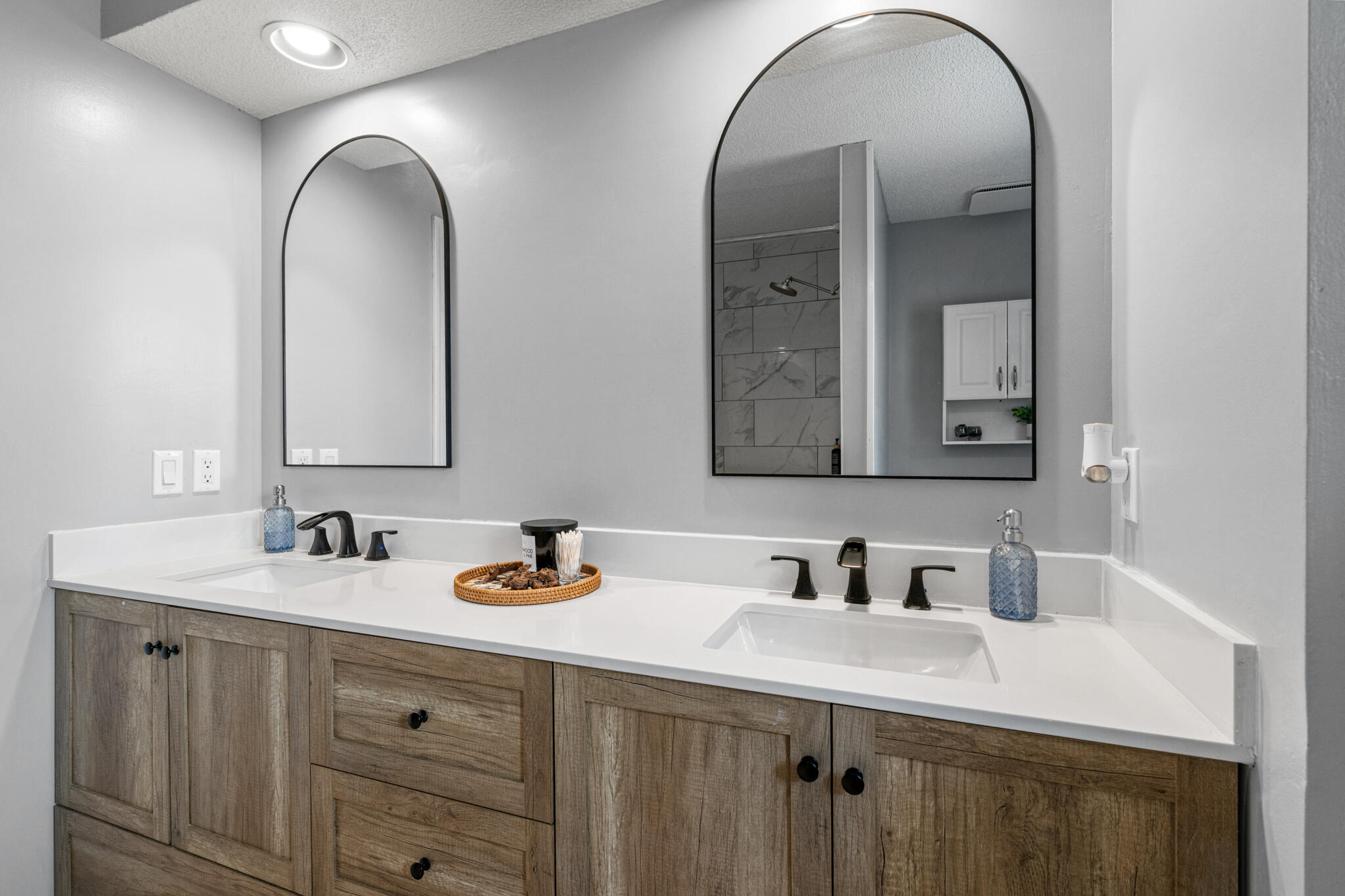 8573 Westview Lane Pensacola, FL 32514 - Photo 22 of 35 a bathroom with a double vanity sink and a mirror