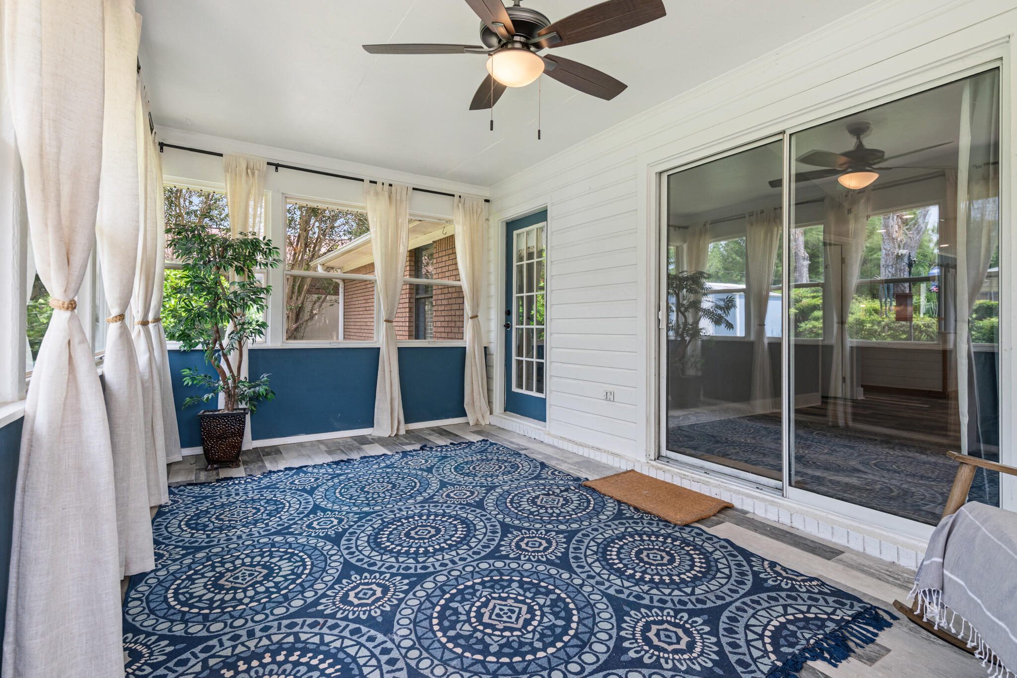 8573 Westview Lane Pensacola, FL 32514 - Photo 31 of 35 a very nice looking room with a large window and chandelier