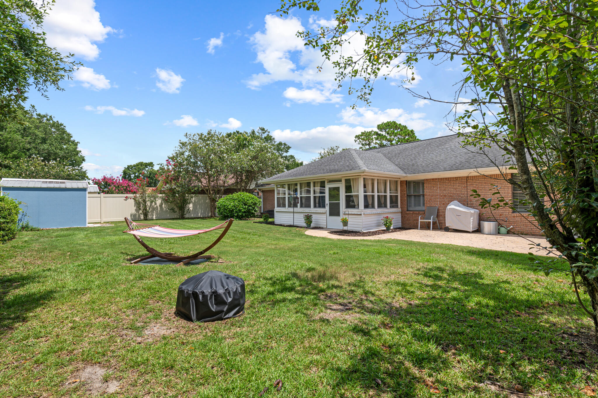 8573 Westview Lane Pensacola, FL 32514 - Photo 33 of 35 a view of a house with backyard and sitting area