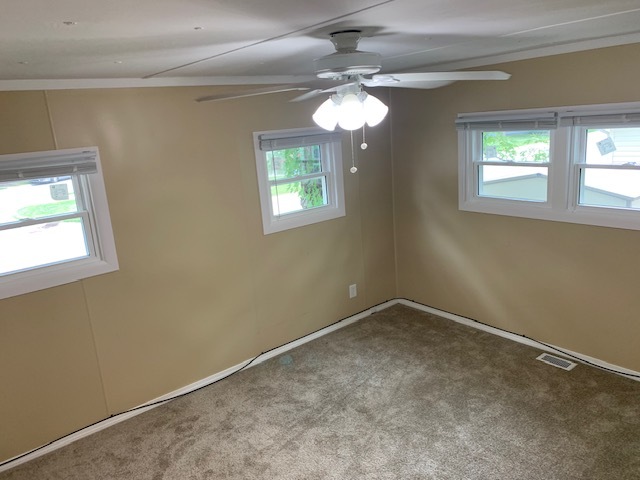 1165 Lake Terrace Road Elgin, IL 60123 - Photo 11 of 14 a view of an empty room with a window
