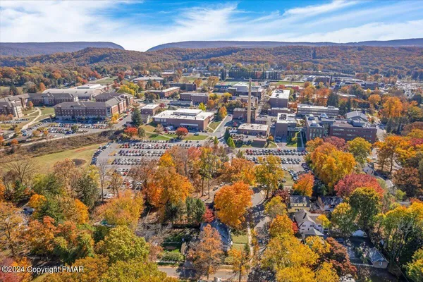 a view of a city with mountain