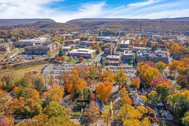 a view of a city with mountain