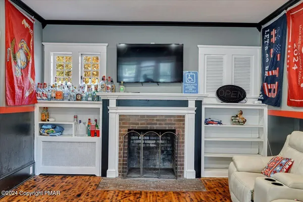 a kitchen with stainless steel appliances granite countertop a sink stove and wooden floor