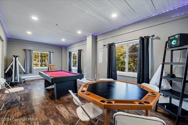 a bed room with a bed and a window