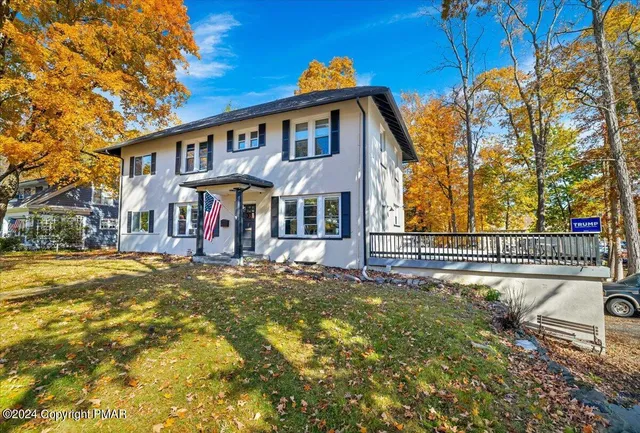 a view of a patio with a bench