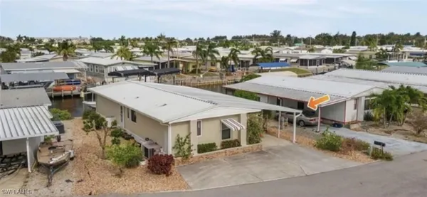 an aerial view of residential building with outdoor space