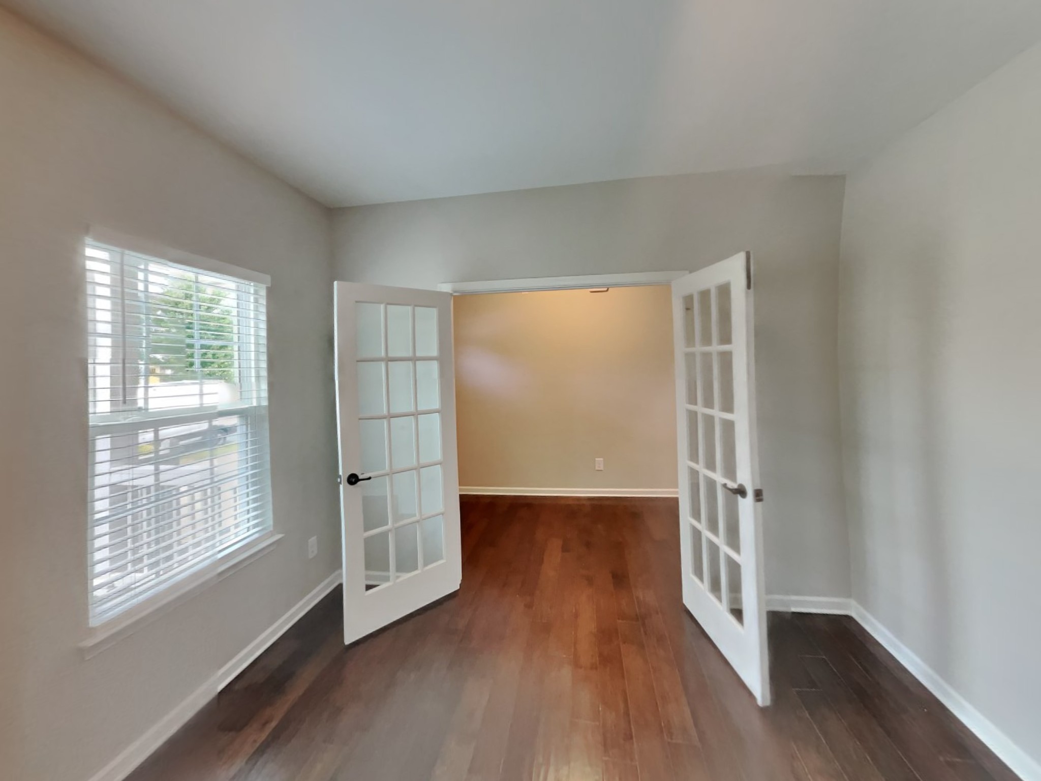 132 Hackney Lane Gallatin, TN 37066 - Photo 21 of 23 an empty room with wooden floor and windows