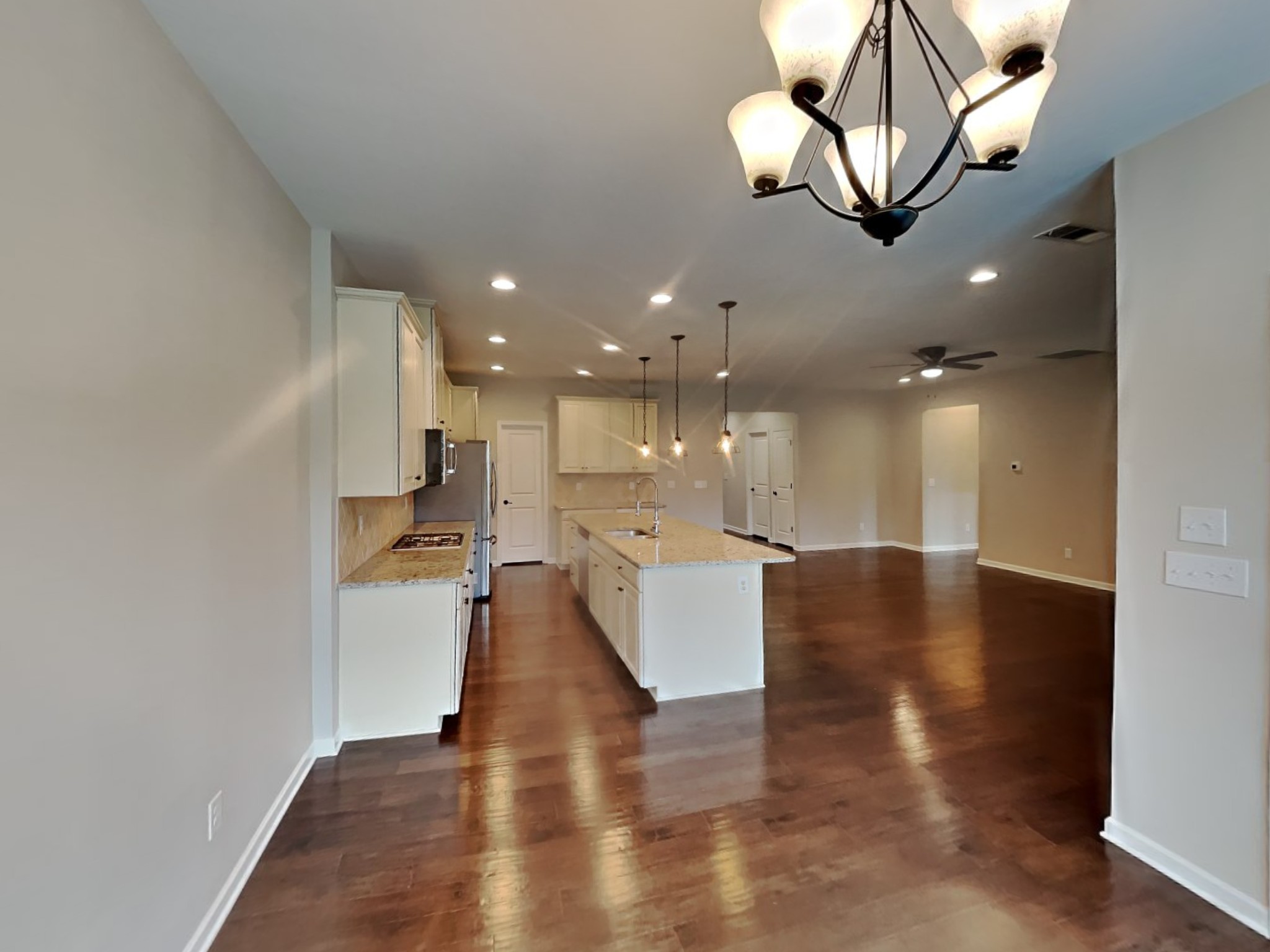 132 Hackney Lane Gallatin, TN 37066 - Photo 5 of 23 a view of a living room and kitchen with stainless steel appliances