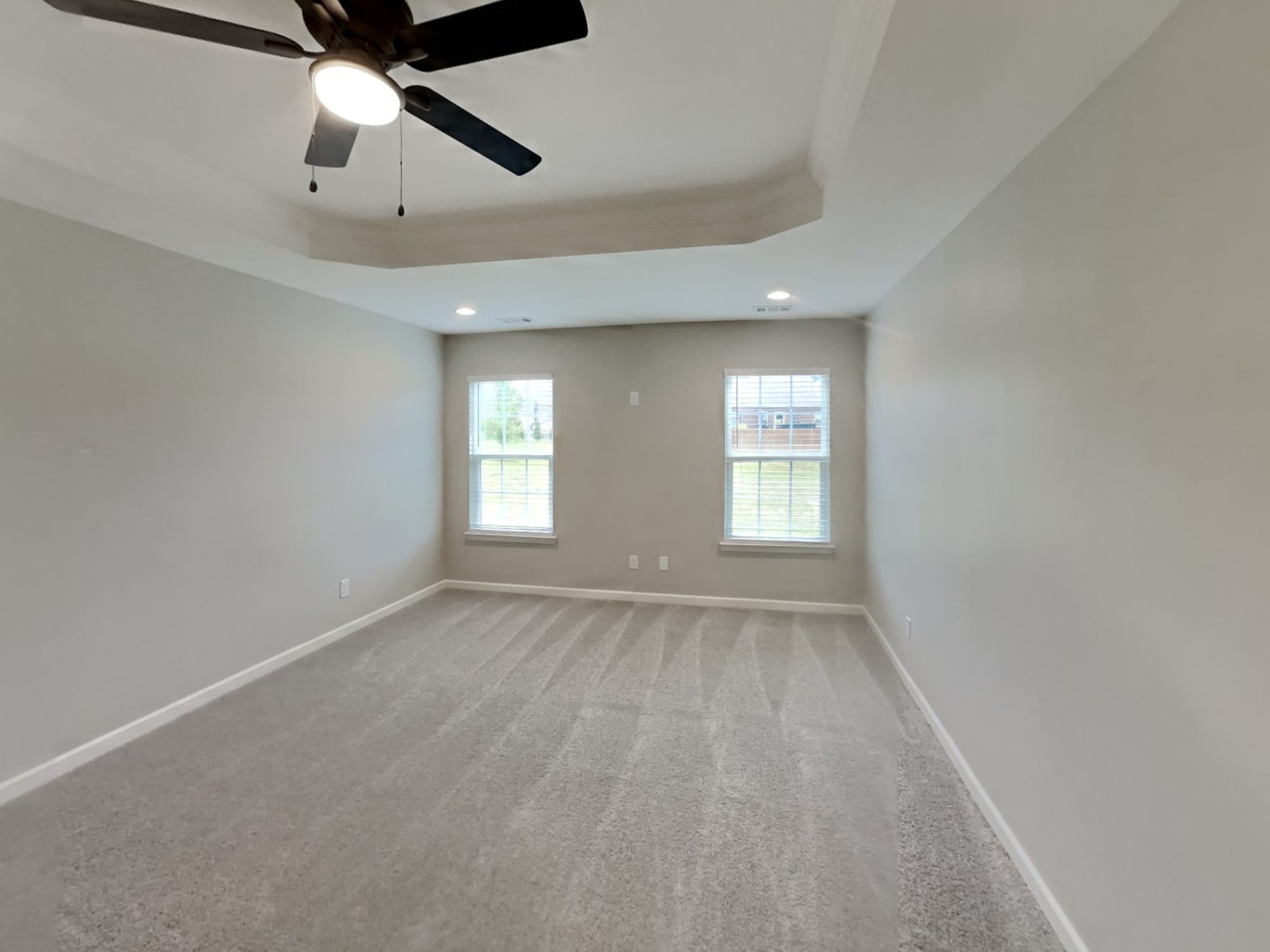 132 Hackney Lane Gallatin, TN 37066 - Photo 8 of 23 an empty room with chandelier fan and windows
