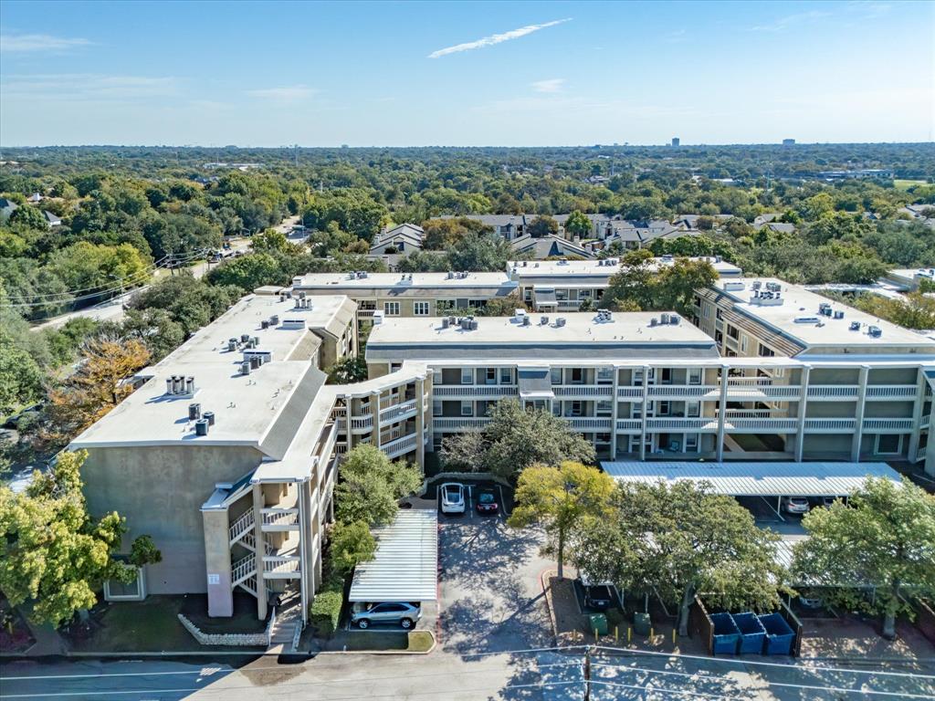 5310 Keller Springs Road, Unit 332 Dallas, TX 75248 - Photo 2 of 38 an aerial view of a house with a yard