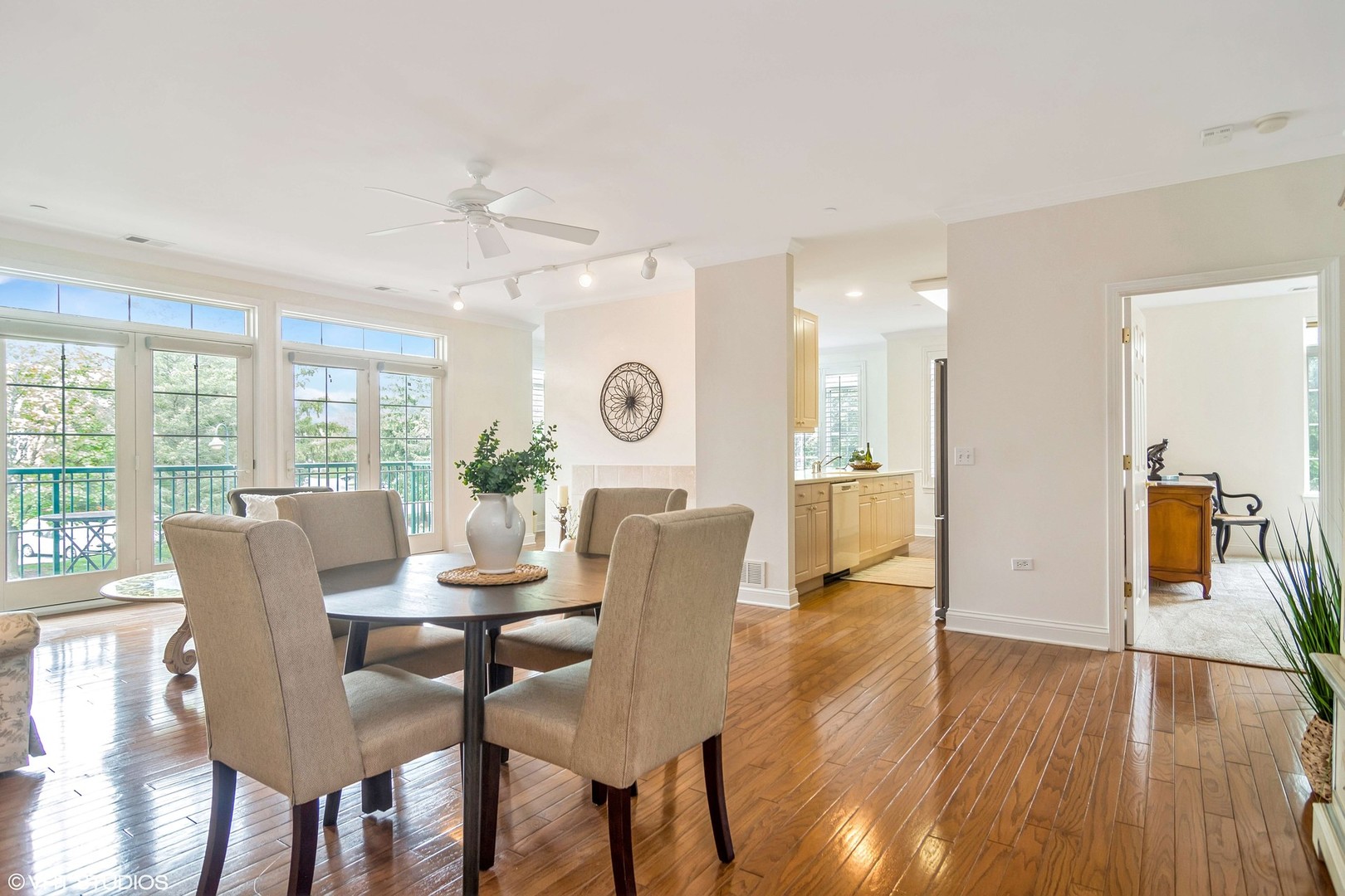 620 McHenry Road, Unit 201 Wheeling, IL 60090 - Photo 2 of 22 a view of a dining room with furniture window and wooden floor