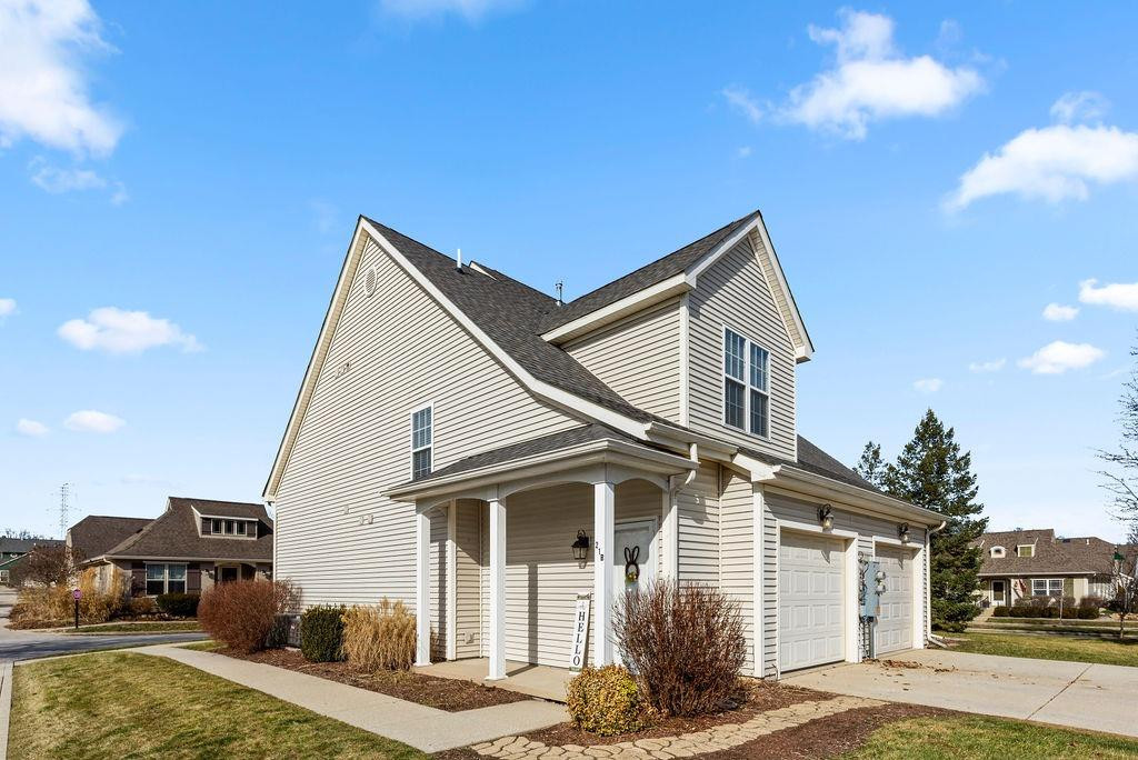 21 B Edinburgh Street Valparaiso, IN 46385 - Photo 2 of 17 a view of a house with a patio