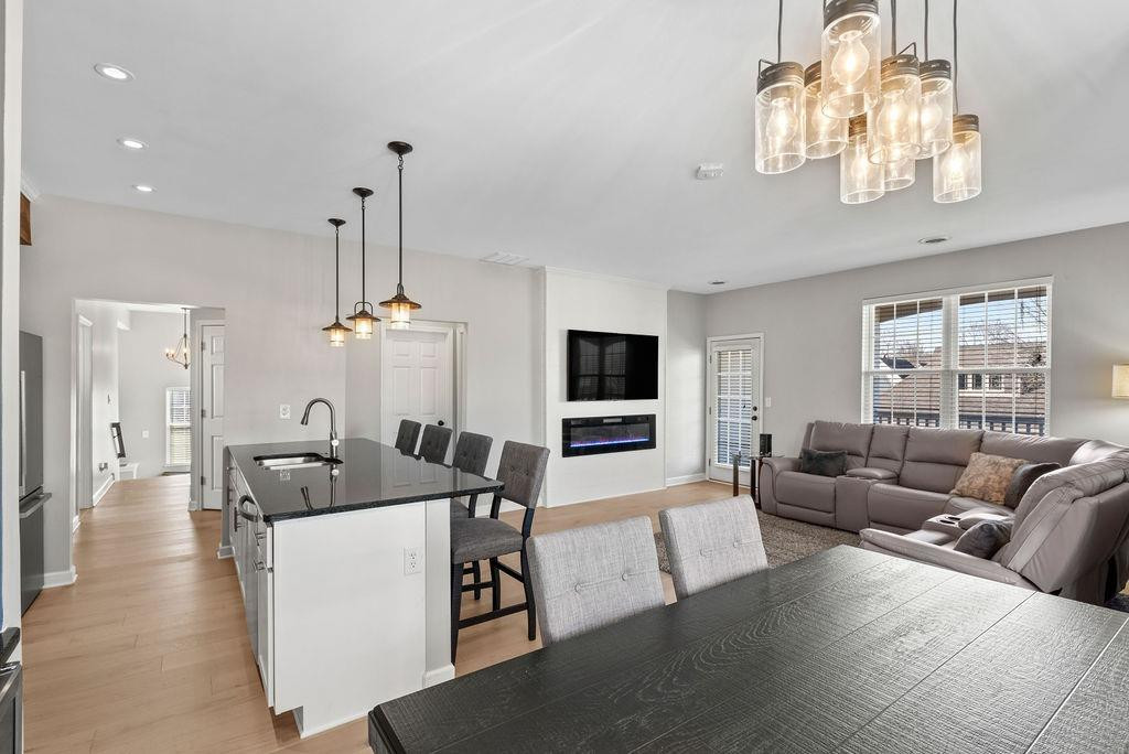 21 B Edinburgh Street Valparaiso, IN 46385 - Photo 3 of 17 a living room with furniture and a flat screen tv