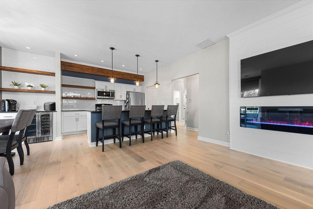 21 B Edinburgh Street Valparaiso, IN 46385 - Photo 9 of 17 a dining room with furniture and kitchen view