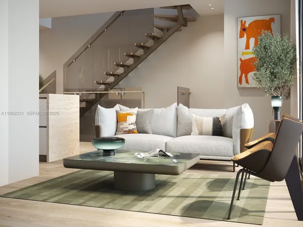 a living room with furniture and a couch