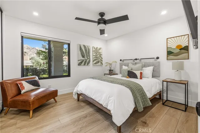 a bed room with a bed and a couch