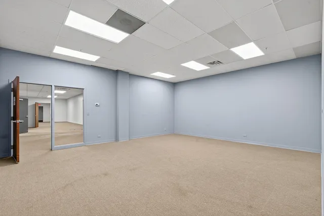 an empty room with a natural light