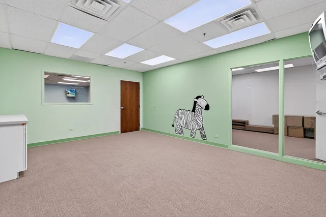 a view of a livingroom with a staircase