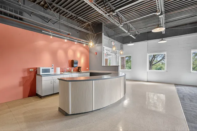 a view of a kitchen with a sink and dishwasher