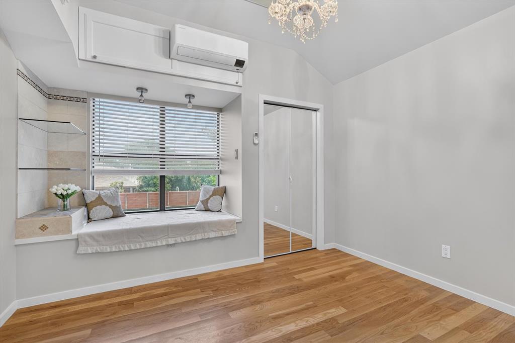 272 Lodge Road Coppell, TX 75019 - Photo 14 of 24 a view of empty room with wooden floor and fan