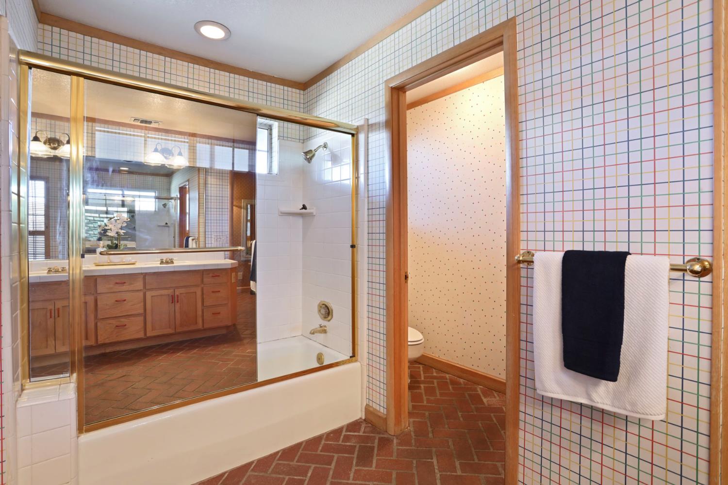 3152 Sea Gull Lane Stockton, CA 95219 - Photo 22 of 67 a bathroom with a shower and a sink