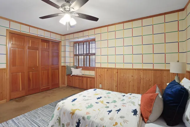 a living room with furniture a wooden floor and a table