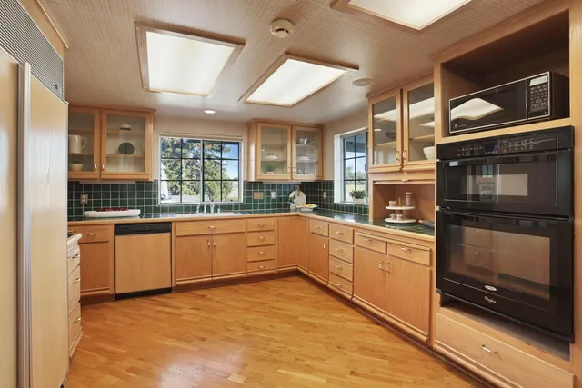 a workspace with furniture and window