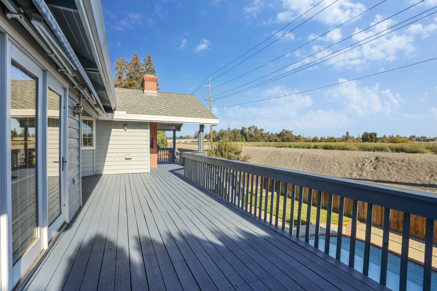 3152 Sea Gull Lane Stockton, CA 95219 - Photo 53 of 67 a view of a balcony with wooden floor