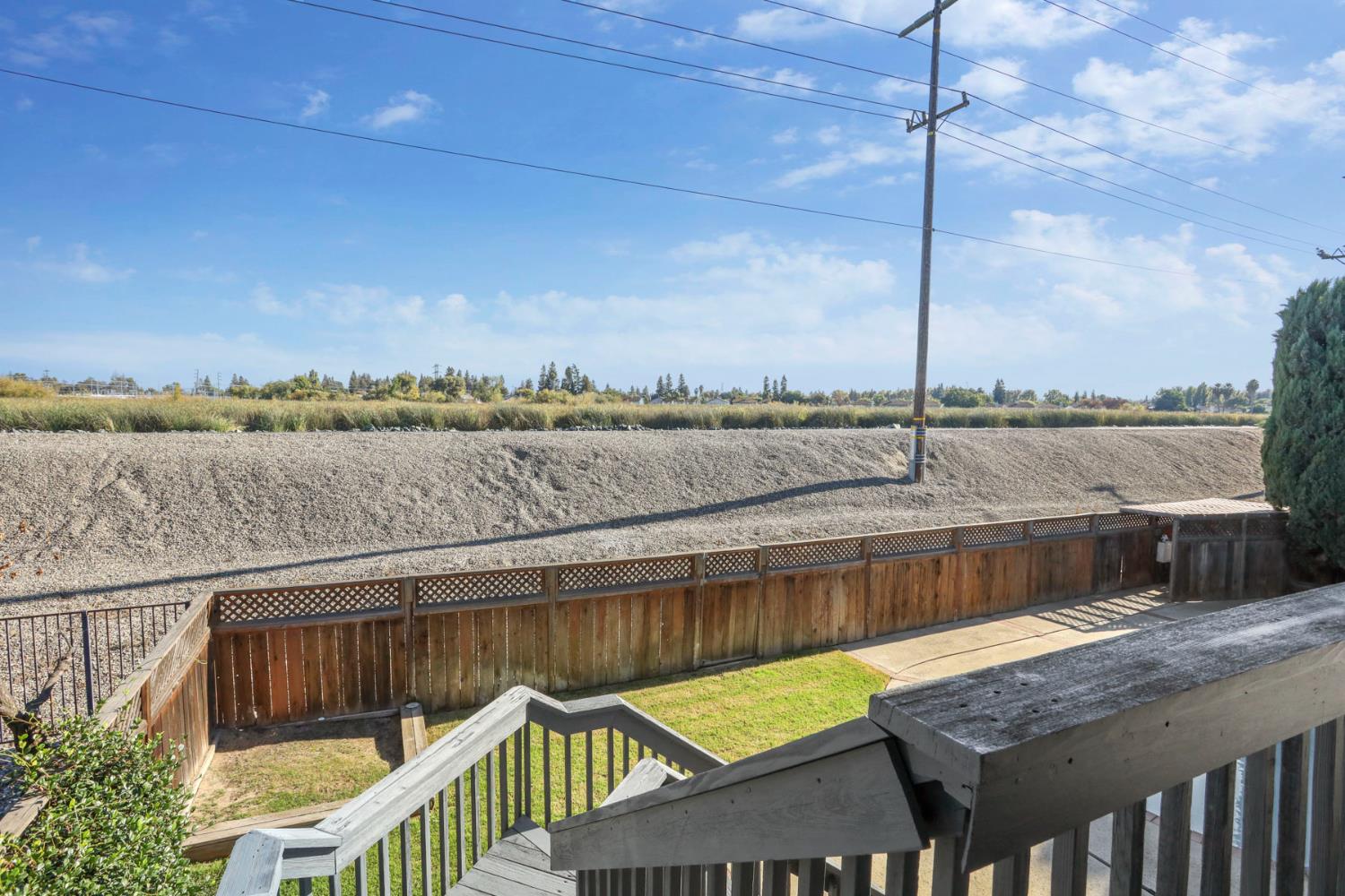 3152 Sea Gull Lane Stockton, CA 95219 - Photo 56 of 67 a view of a lake with a deck