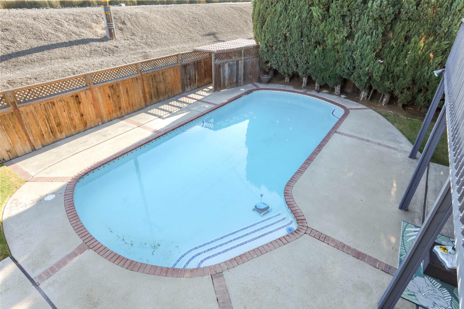 3152 Sea Gull Lane Stockton, CA 95219 - Photo 57 of 67 a view of a swimming pool with a balcony