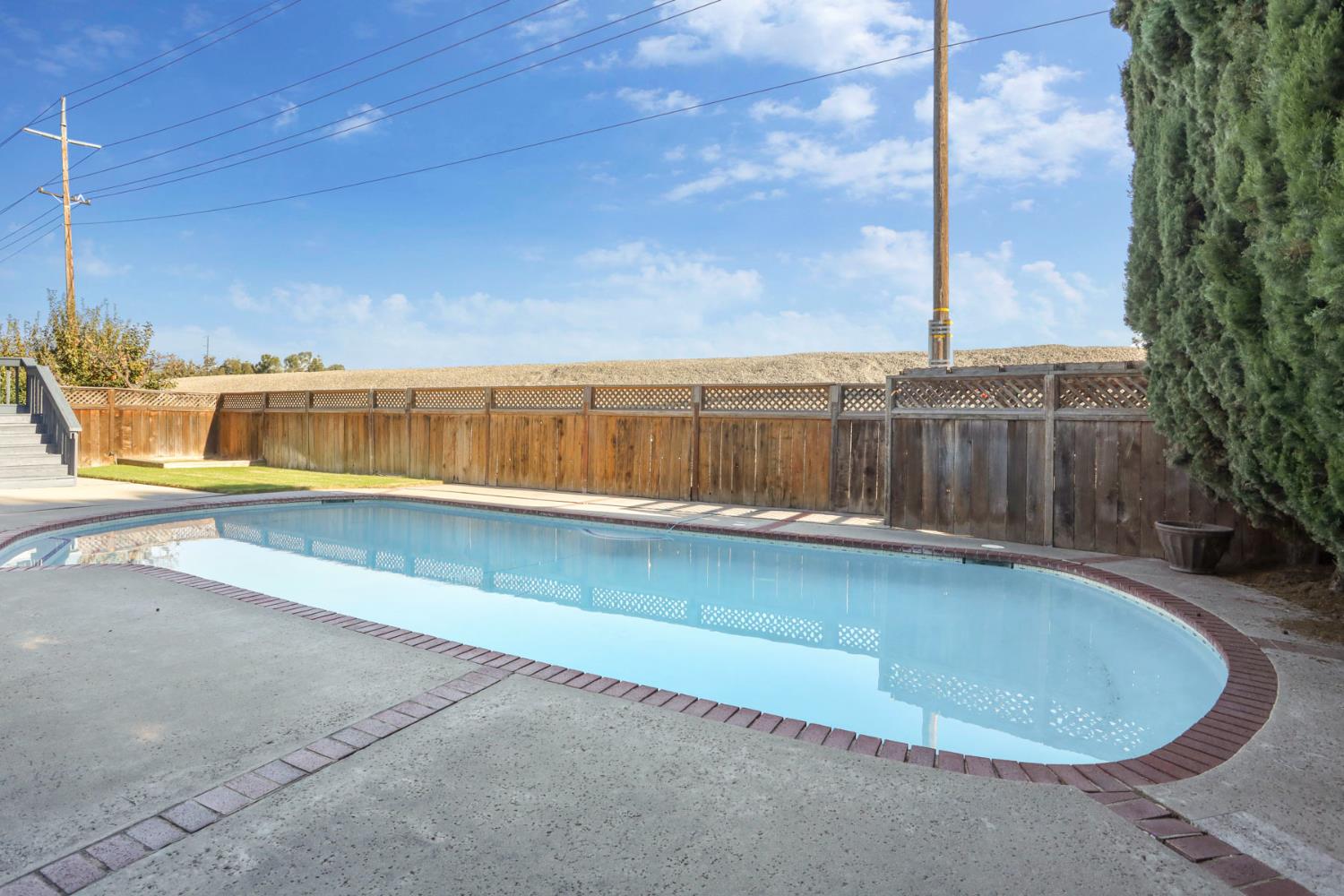 3152 Sea Gull Lane Stockton, CA 95219 - Photo 58 of 67 a view of a swimming pool with a lake view