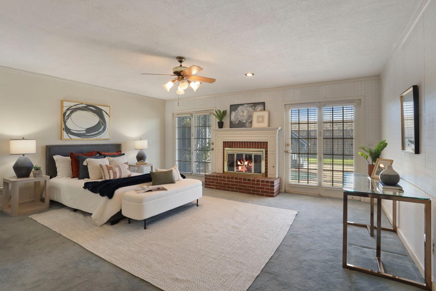 3152 Sea Gull Lane Stockton, CA 95219 - Photo 6 of 67 a living room with furniture a fireplace and a flat screen tv