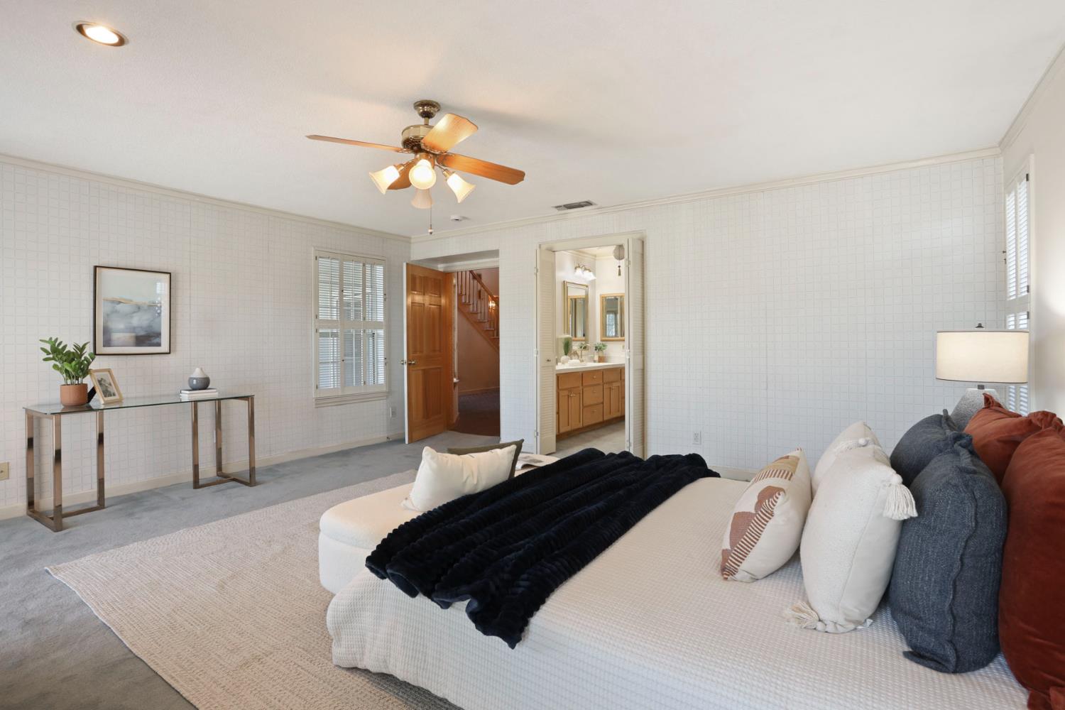 3152 Sea Gull Lane Stockton, CA 95219 - Photo 7 of 67 a bedroom with a large bed and a chandelier