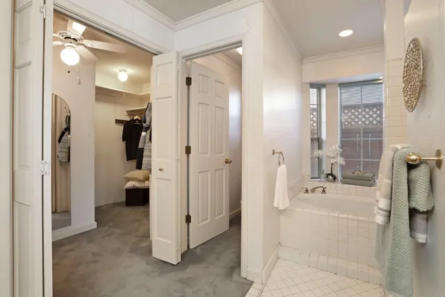 a bathroom with a shower and a sink