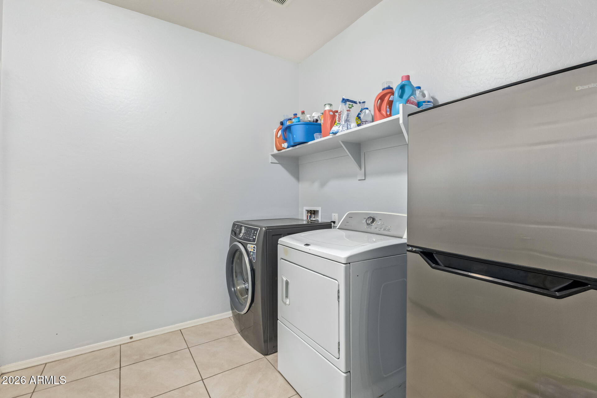10326 West Payson Road Tolleson, AZ 85353 - Photo 23 of 27 a utility room with dryer and washer