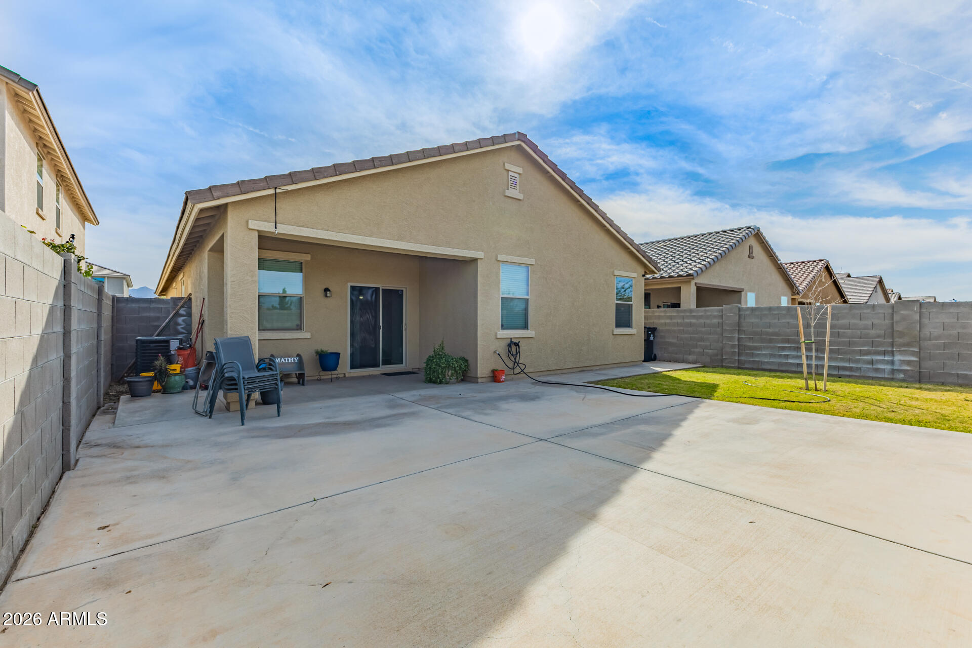 10326 West Payson Road Tolleson, AZ 85353 - Photo 24 of 27 a view of house with swimming pool outdoor seating