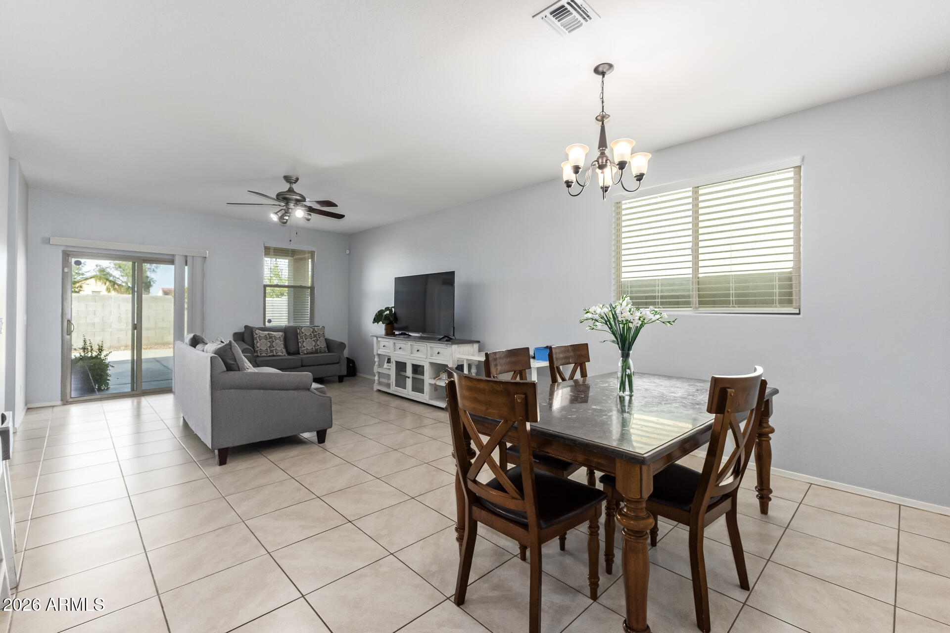 10326 West Payson Road Tolleson, AZ 85353 - Photo 9 of 27 a view of a livingroom with furniture and window