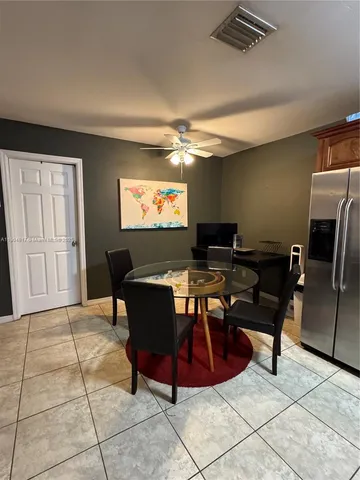 a view of a dining room with furniture