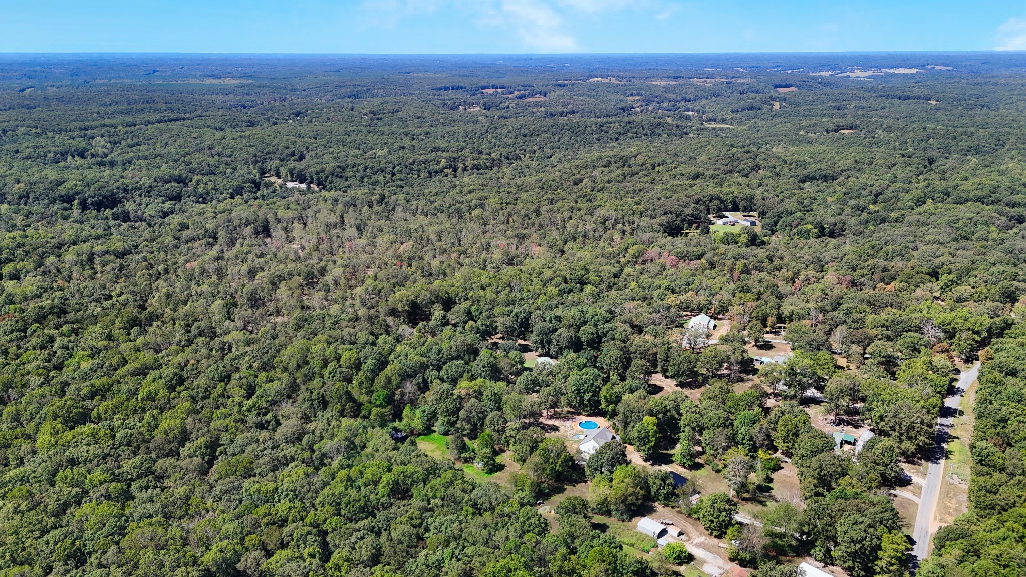 0 Oak Springs Road Nunnelly, TN 37137 - Photo 8 of 24 a view of a city with lush green forest