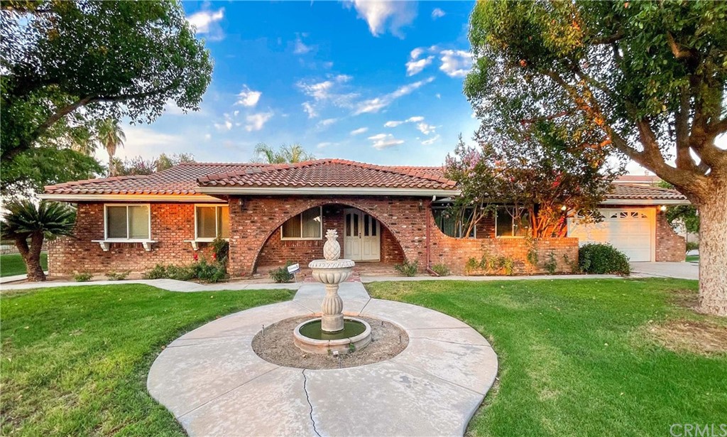 2645 McAllister Street Riverside, CA 92503 - Photo 1 of 1 a front view of a house with garden