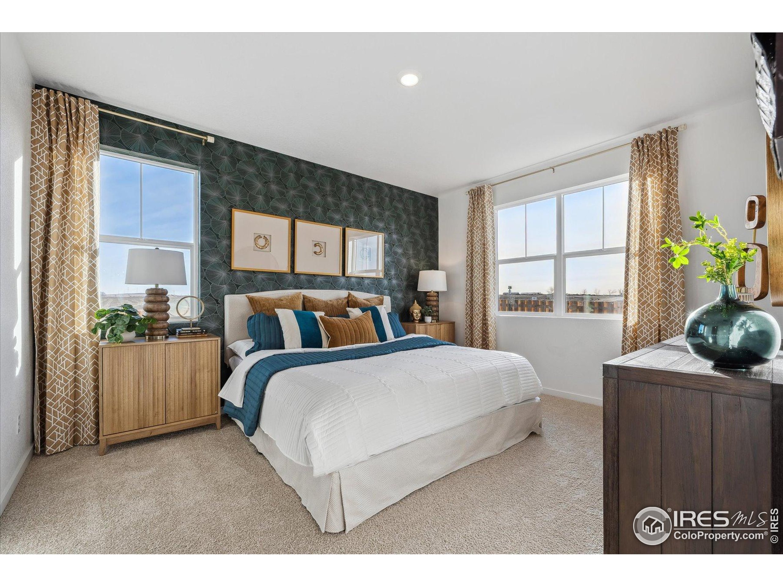 2207 Crosswind Street Fort Lupton, CO 80621 - Photo 18 of 26 a bedroom with a bed and window