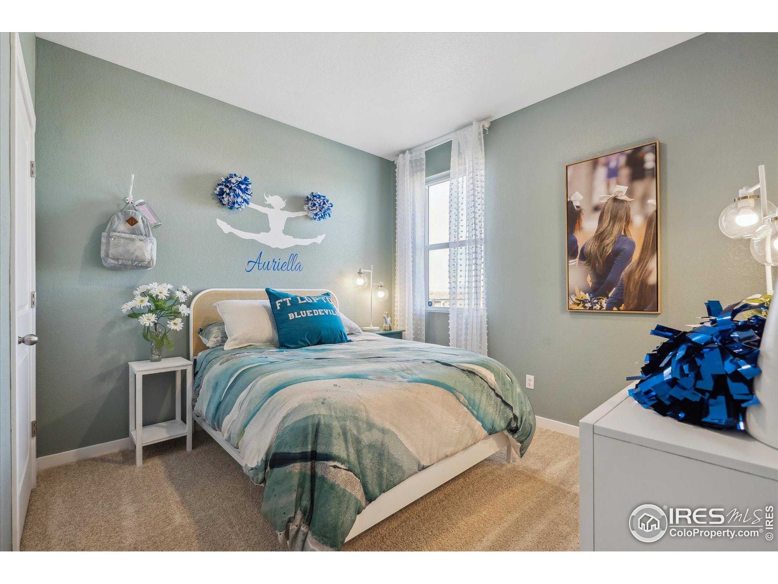 2207 Crosswind Street Fort Lupton, CO 80621 - Photo 24 of 26 a bedroom with two beds and a window