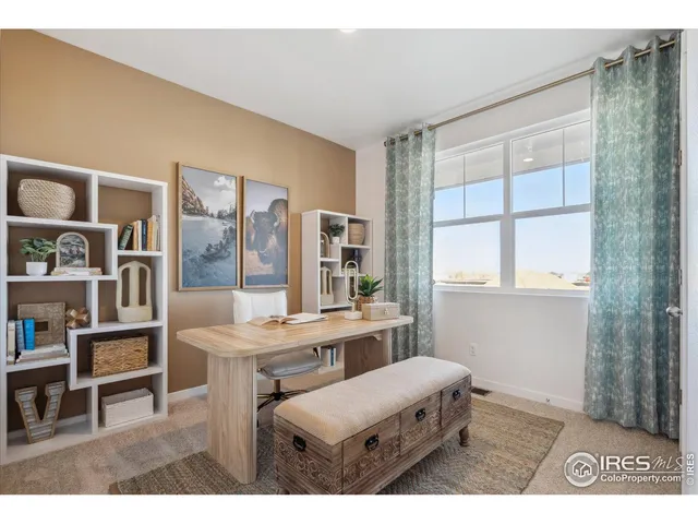 a living room with a couch and a table in it