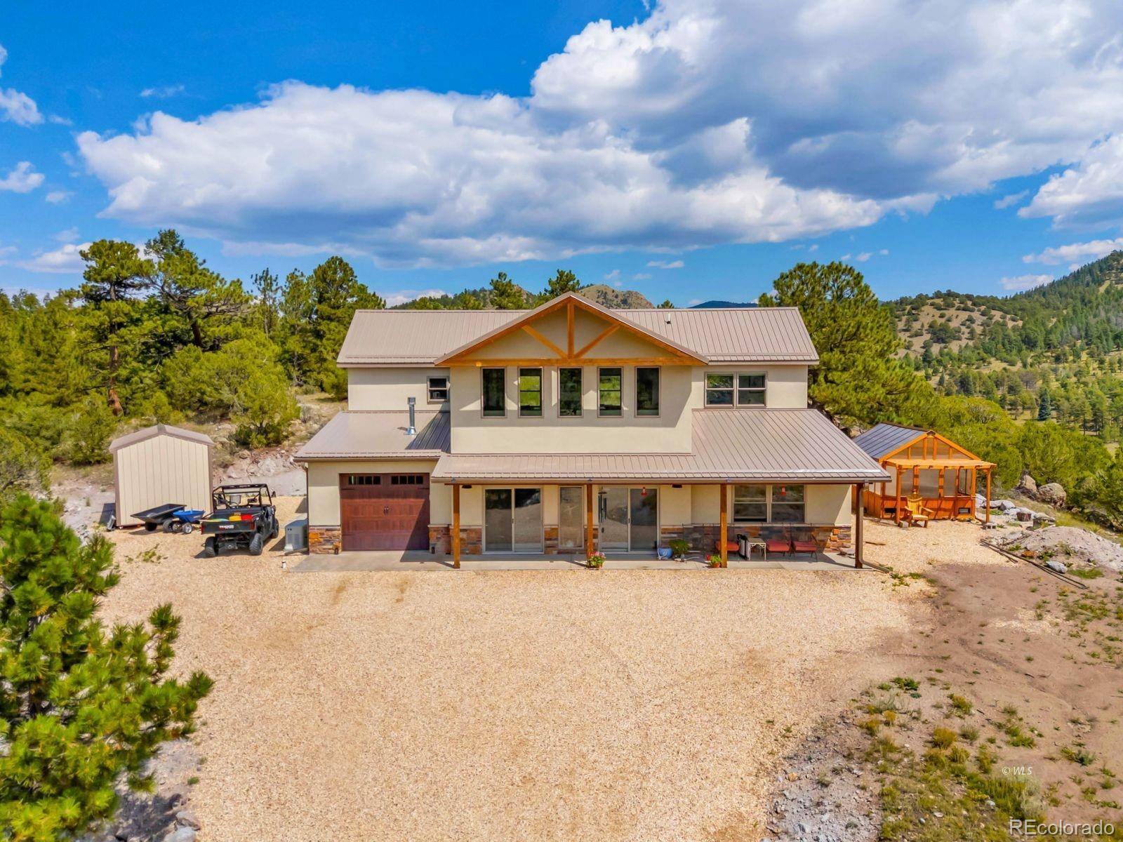 780 County Road 326 Westcliffe, CO 81252 - Photo 1 of 35 a view of house with outdoor space and sitting area
