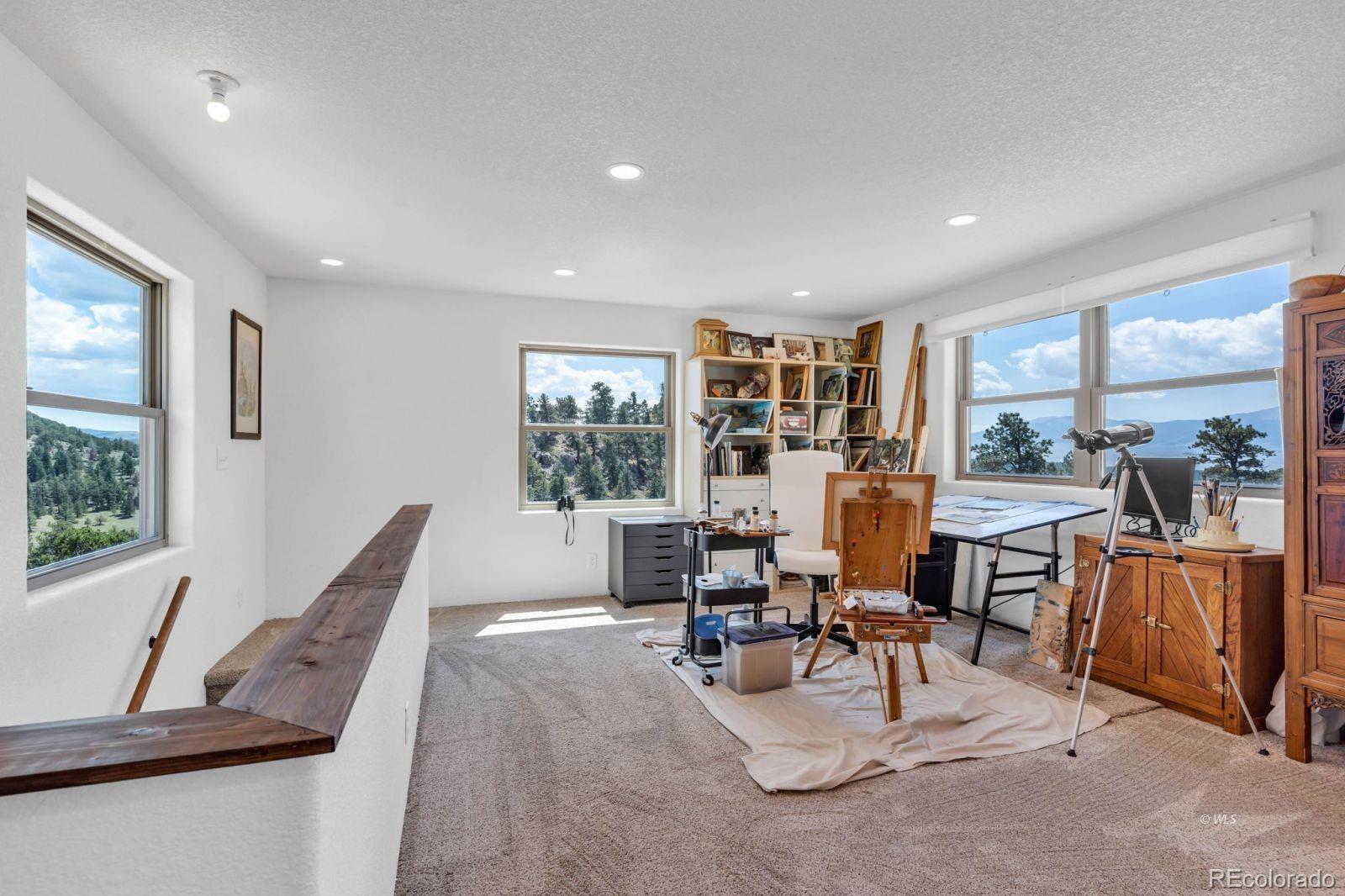 780 County Road 326 Westcliffe, CO 81252 - Photo 18 of 35 a view of a dining room with furniture window and outside view