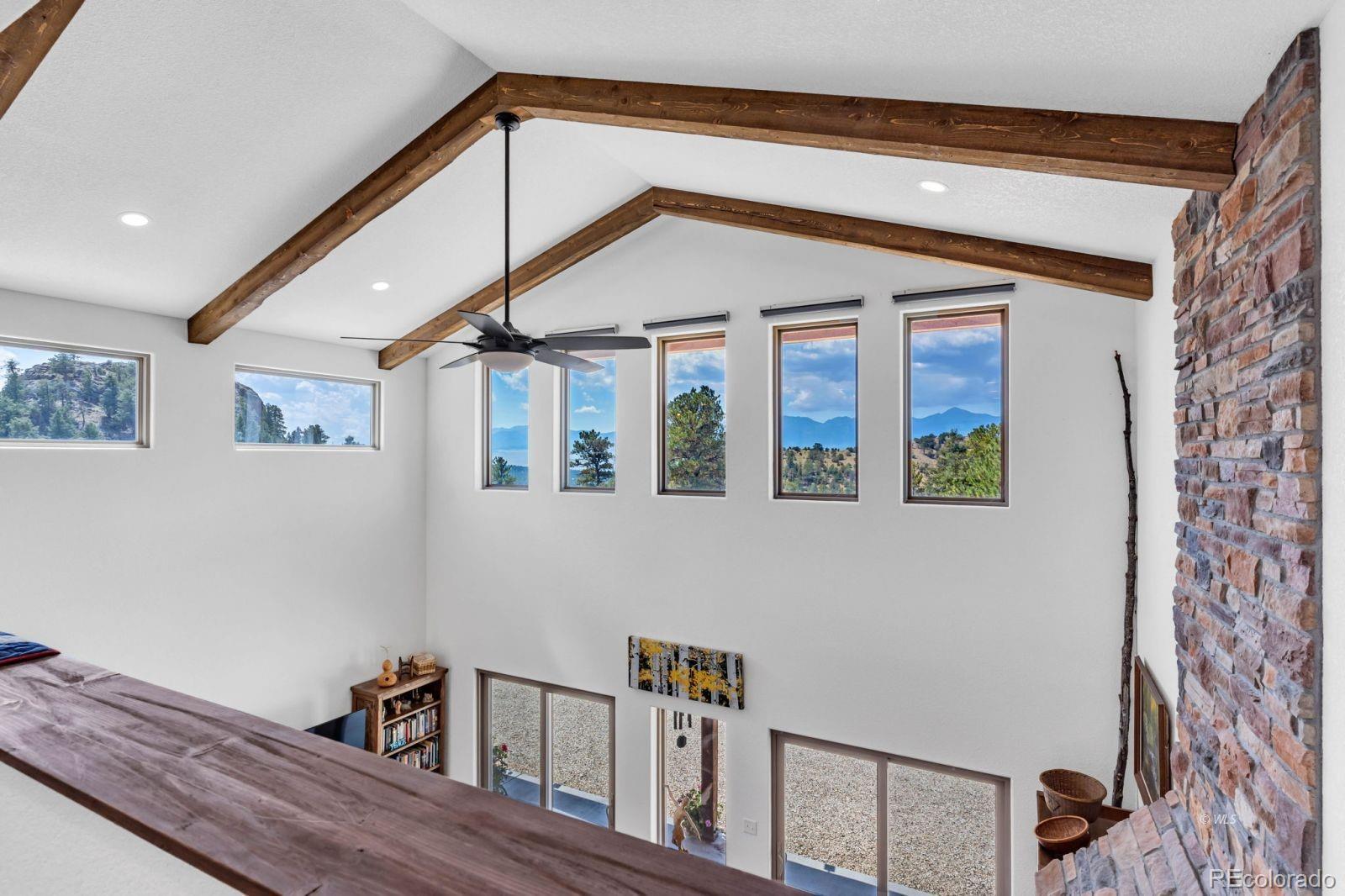 780 County Road 326 Westcliffe, CO 81252 - Photo 20 of 35 a house view with a wooden floor and a window