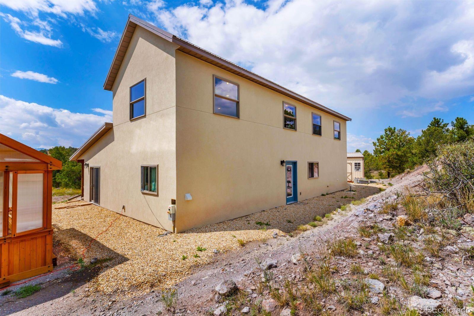 780 County Road 326 Westcliffe, CO 81252 - Photo 24 of 35 a front view of a house with a yard