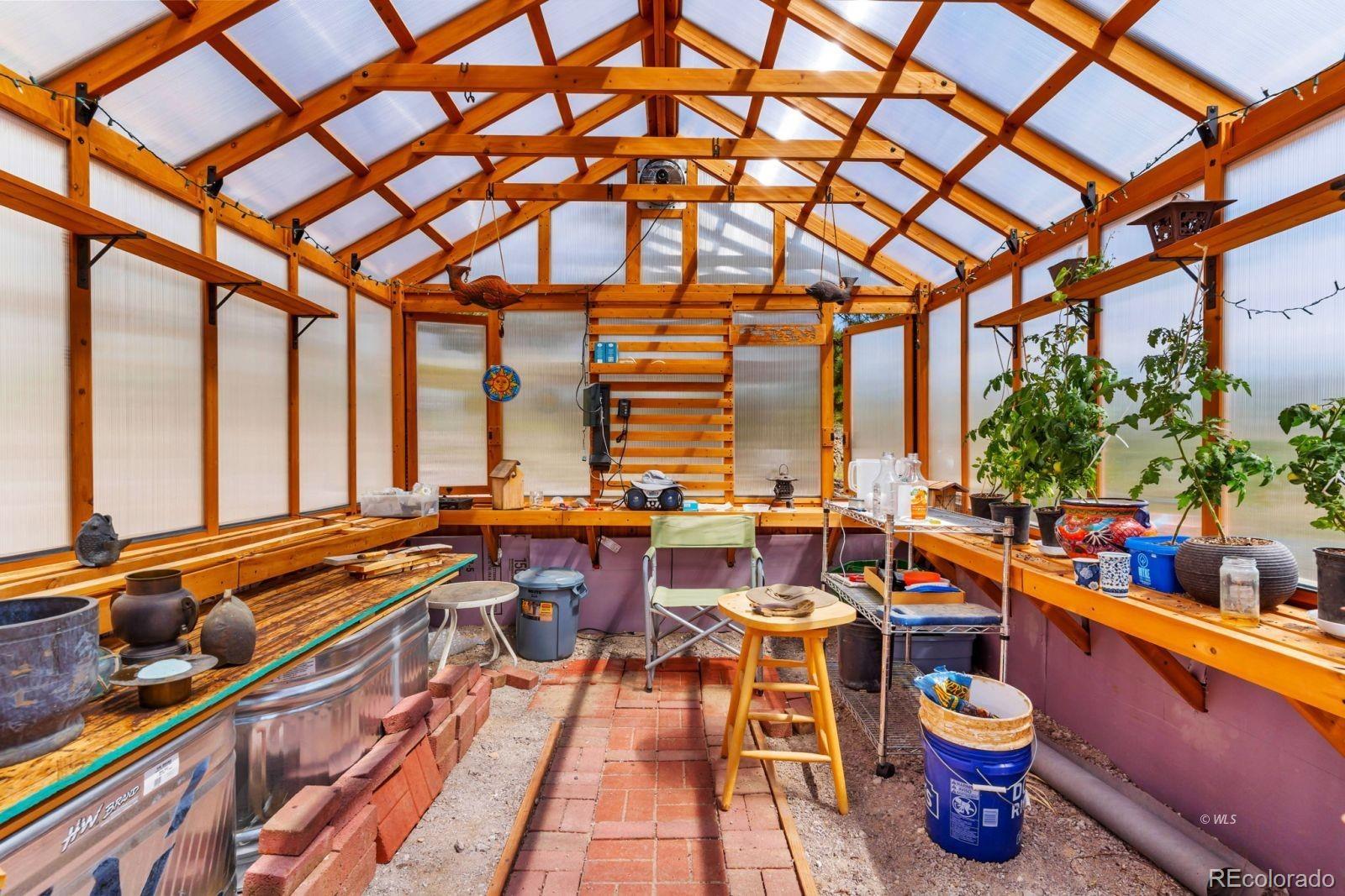 780 County Road 326 Westcliffe, CO 81252 - Photo 25 of 35 a very nice looking room with many windows and furniture