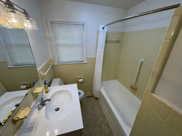a bathroom with a sink and toilet
