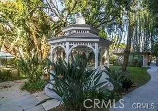 a view of outdoor space with deck and tree